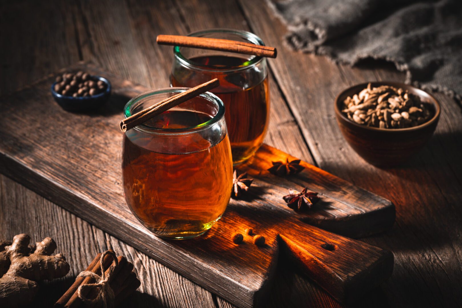 Warm tea on wooden board