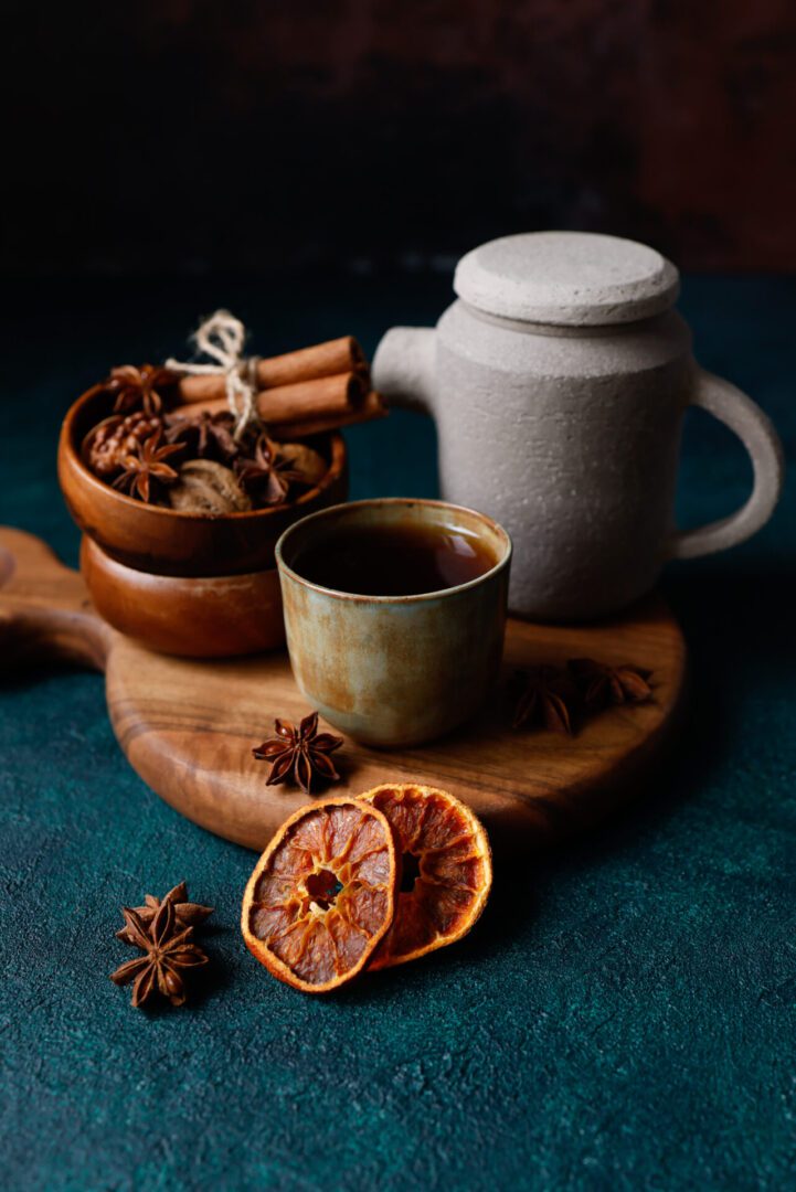Ceramic teapot and spiced tea arrangement